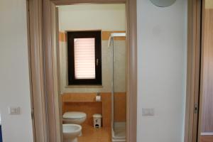 Koupelna v ubytování Portoada Park Villas