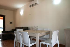 Posezení v ubytování Portoada Park Villas