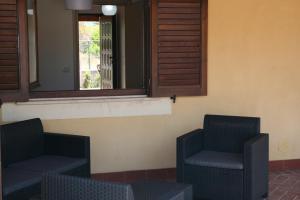 Posezení v ubytování Portoada Park Villas