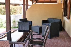 Posezení v ubytování Portoada Park Villas