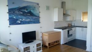 Köök või kööginurk majutusasutuses Chalet 18 Widemouth Bay Holiday Village