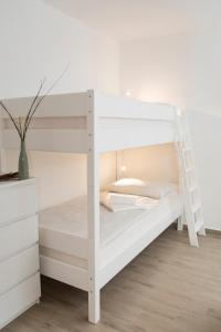 Ένα ή περισσότερα κρεβάτια σε δωμάτιο στο Apartment Vidus Wine Estate