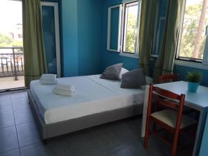 Voodi või voodid majutusasutuse Monte Blu Holiday Apartment toas