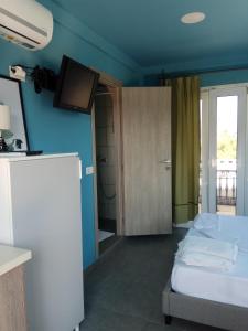 Voodi või voodid majutusasutuse Monte Blu Holiday Apartment toas