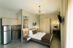 Posteľ alebo postele v izbe v ubytovaní Frangeo boutique rooms