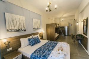 Posteľ alebo postele v izbe v ubytovaní Frangeo boutique rooms