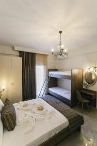 Posteľ alebo postele v izbe v ubytovaní Frangeo boutique rooms