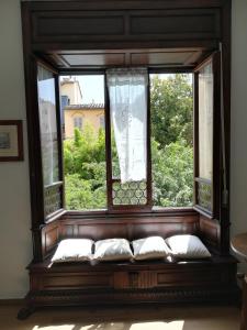 Posteľ alebo postele v izbe v ubytovaní Giardino D'Azeglio Locazione Turistica