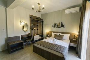 Posteľ alebo postele v izbe v ubytovaní Frangeo boutique rooms
