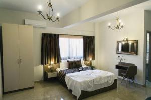 Posteľ alebo postele v izbe v ubytovaní Frangeo boutique rooms