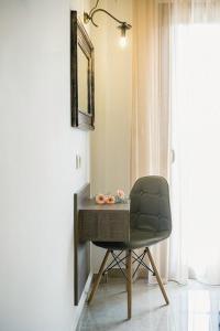 Televízia a/alebo spoločenská miestnosť v ubytovaní Frangeo boutique rooms