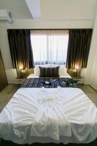 Posteľ alebo postele v izbe v ubytovaní Frangeo boutique rooms