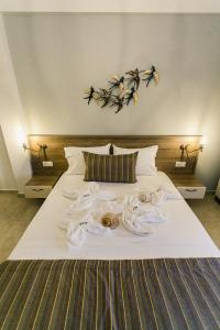 Posteľ alebo postele v izbe v ubytovaní Frangeo boutique rooms