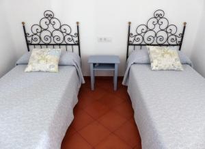 Łóżko lub łóżka w pokoju w obiekcie Agroturismo Son Triay