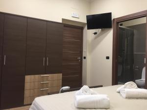 Postel nebo postele na pokoji v ubytování B&B Duomo Apartament