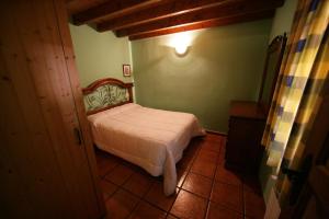 Posteľ alebo postele v izbe v ubytovaní Alojamientos Rurales El Fontano