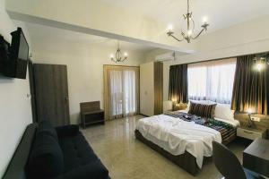 Posteľ alebo postele v izbe v ubytovaní Frangeo boutique rooms