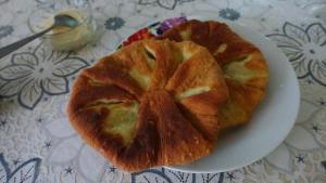 a pie sitting on a plate on a table at Breb 418, Casa Opris in Breb +22 photos