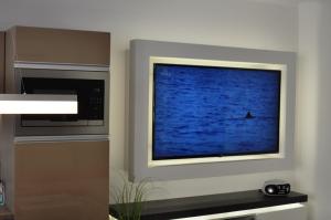 A television and/or entertainment centre at gyorapartman-TOP