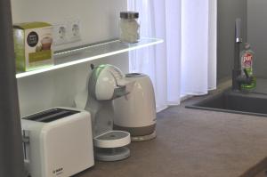 A kitchen or kitchenette at gyorapartman-TOP