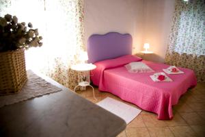 Cama ou camas em um quarto em Casa Vacanza Francesca #12