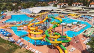 an aerial view of a water park with a water slide at Apartmani Huško in Tuheljske Toplice