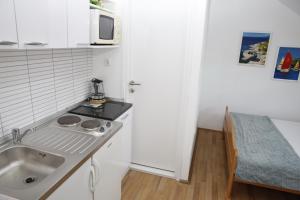 Кухня або міні-кухня у Apartments Stonehouse