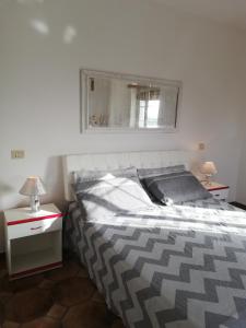 Postel nebo postele na pokoji v ubytování Villa Rita