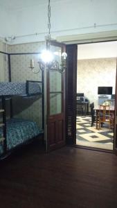 Ένα ή περισσότερα κρεβάτια σε δωμάτιο στο En La Plata Hostel El Pampa