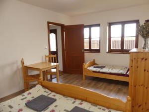 Postel nebo postele na pokoji v ubytování Apartmány Turold Mikulov