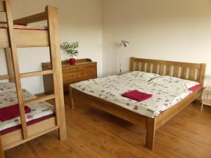 Postel nebo postele na pokoji v ubytování Apartmány Turold Mikulov