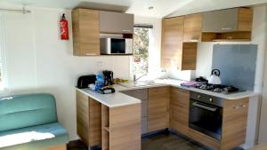 Una cocina o kitchenette en Mobile home