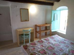 Кровать или кровати в номере Apartman DINKO