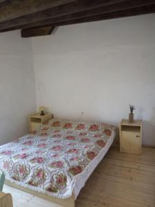 Кровать или кровати в номере Apartman DINKO