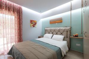 Postel nebo postele na pokoji v ubytování Villas Ve