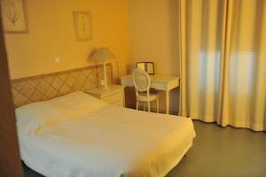 Кровать или кровати в номере Franceschini