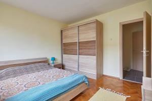 Postel nebo postele na pokoji v ubytování Square Vanilla Apartments