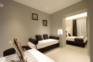 ETNEA STYLE CATANIA LUXURY ROOMS客房内的一张或多张床位