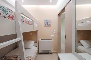 Postel nebo postele na pokoji v ubytování Villas Ve