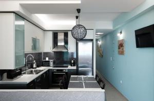 Kuchyň nebo kuchyňský kout v ubytování Villas Ve + 31 fotografií