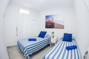 Posteľ alebo postele v izbe v ubytovaní Casa Elo