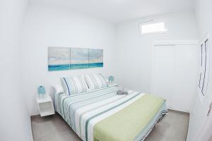 Posteľ alebo postele v izbe v ubytovaní Casa Elo