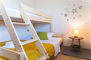 a bedroom with a bunk bed with a ladder at Villa Nava in Benkovac +34 photos