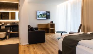 Voodi või voodid majutusasutuse Hotel South Coast toas