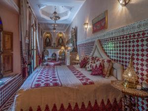 Postel nebo postele na pokoji v ubytování Riad & Spa Laurence Olivier
