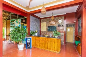 a restaurant with a counter in a room at Bai Dinh Eco Homestay in Ninh Binh