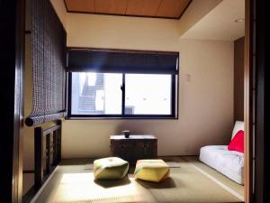 Postel nebo postele na pokoji v ubytování NAOUMI HOUSE