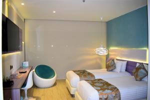 Cama ou camas em um quarto em Hotel Catedral Plaza