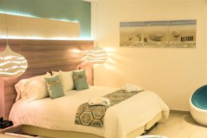 Cama ou camas em um quarto em Hotel Catedral Plaza