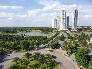 an aerial view of a city with a river and tall buildings at THOC ECOPARK Blue home -0916 with Golf course View in HÆ°ng YÃªn